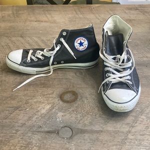 Early 2000’s (2007) pair of size 12 black leather converse. Excellent condition